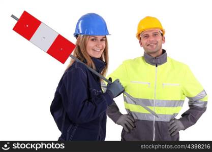 Two construction workers