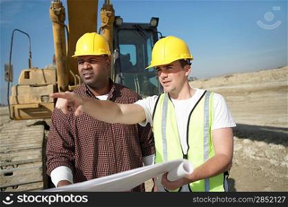 Two Construction Workers on Site