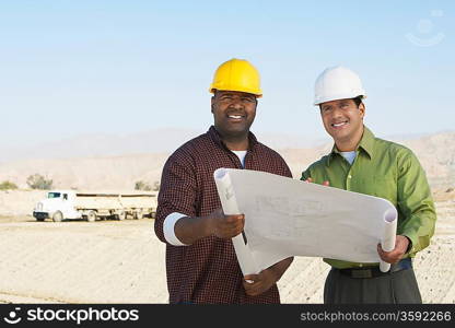 Two Construction Workers on Site