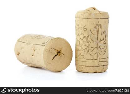 Two corks from wine bottles on white background