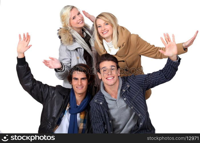 Two couples in winter clothing