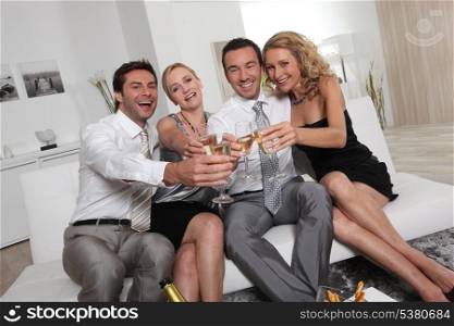 Two couples partying