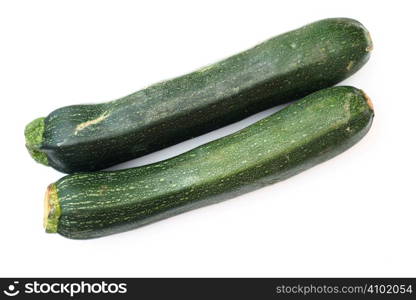 two courgettes isolated over a white background