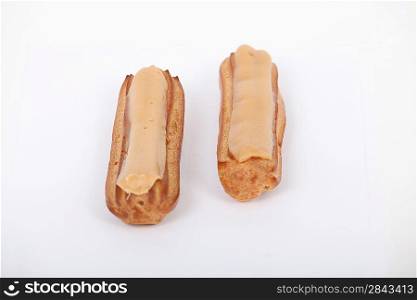 Two cream eclairs