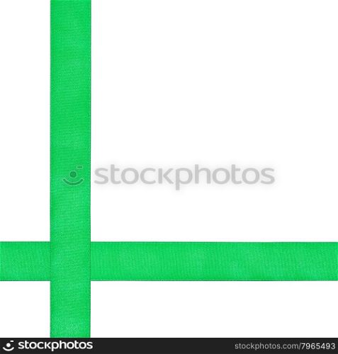 two crossing green satin ribbons isolated on white background
