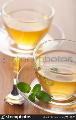 two cups of green tea with mint