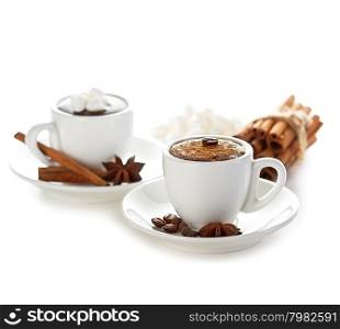 two cups of hot chocolate with cinnamon sticks isolated