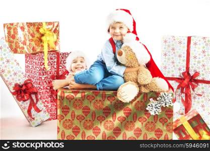 Two cute brothers with gifts