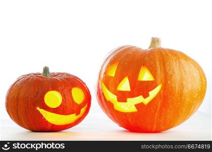 Two cute Halloween pumpkins isolated on white background. Halloween pumpkins