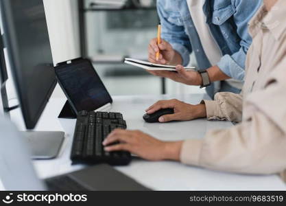 Two developer programmer typing code and writing data while discussing about programming website.