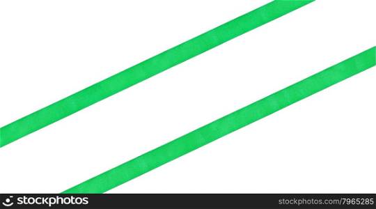 two diagonal parallel green satin ribbons isolated on white background
