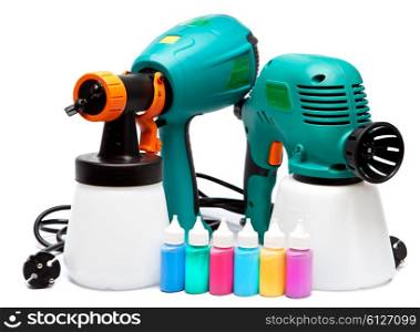 two different construction electrical spray gun for pulverization of color and small bottles with color