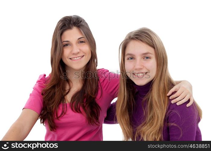 Two different sisters smiling isolated on a white background