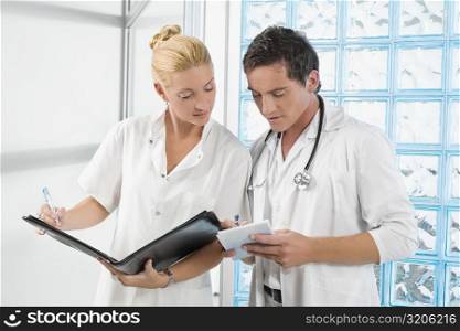 Two doctors discussing a medical report