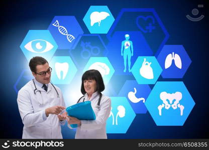 Two doctors discussing issues in telemedicine concept