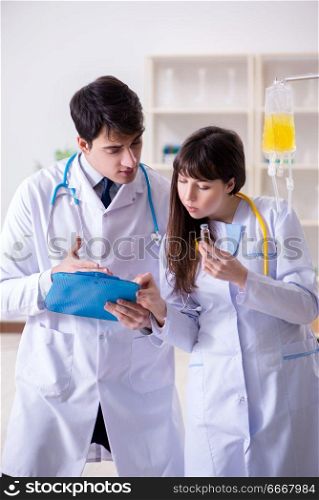 Two doctors discussing plasma and blood transfusion