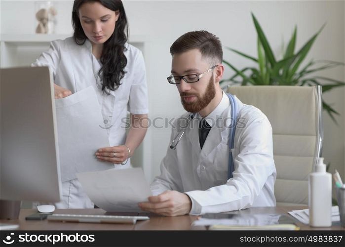 Two doctors discussing test results