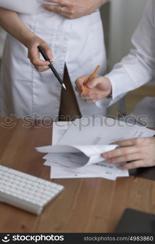 Two doctors discussing test results