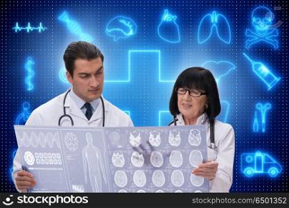 Two doctors discussing x-ray image in telemedicine concept