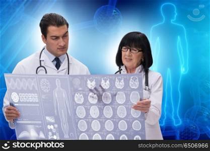 Two doctors discussing x-ray image in telemedicine concept
