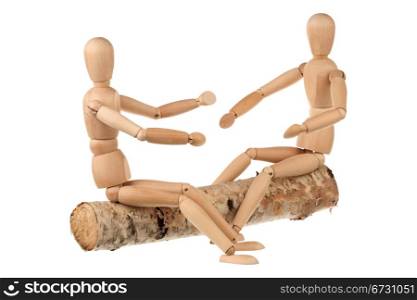 Two dummy and the log isolated on white background