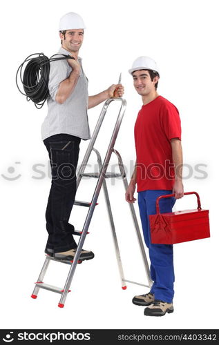 Two electrician with step ladder