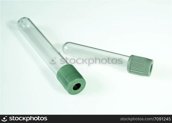 Two empty blood test tubes isolated on white background. Empty blood test tubes