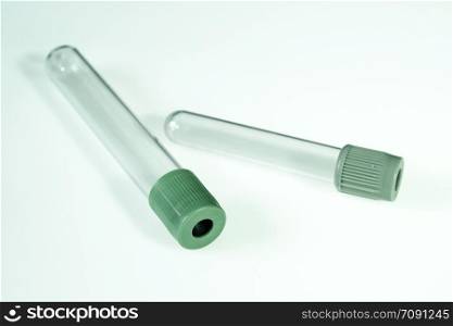 Two empty blood test tubes isolated on white background. Empty blood test tubes