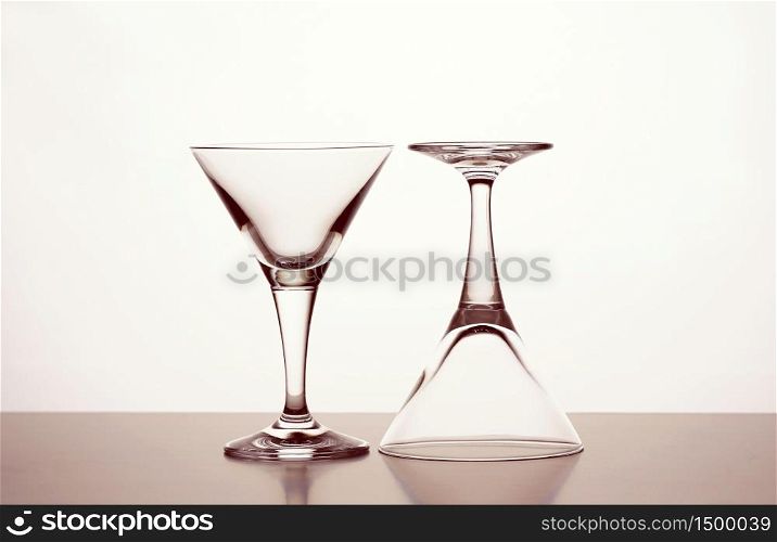 Two Empty cocktail goblet on white background