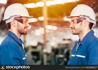 Two engineer standing  face to face. Gay worker looking together.