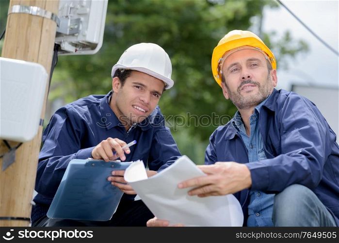 two engineers at construction site in urban city