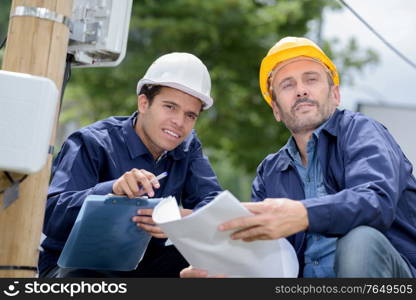 two engineers at construction site in urban city