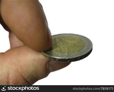 Two euro coin between the fingers of male