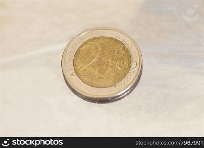 two euro coin closeup on metal background