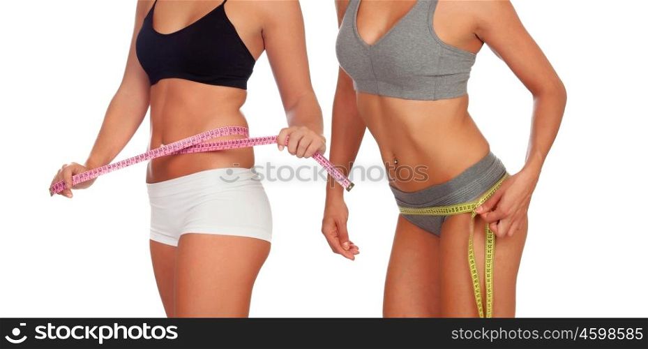 Two female bodies with tape measure in underwear isolated on white
