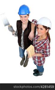Two female bricklayers
