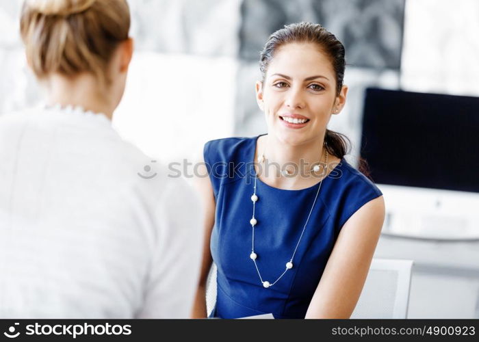 Two female colleagues in office. Two female colleagues working together in office