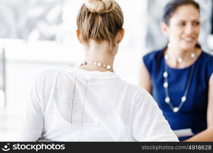 Two female colleagues in office. Two female colleagues working together in office