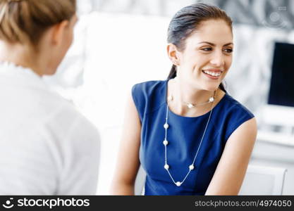 Two female colleagues in office. Two female colleagues working together in office