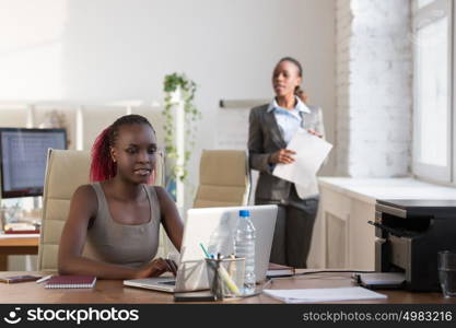 Two female colleagues working together