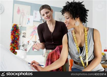 Two female fashion designers