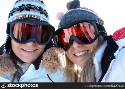 Two female friends in ski clothing