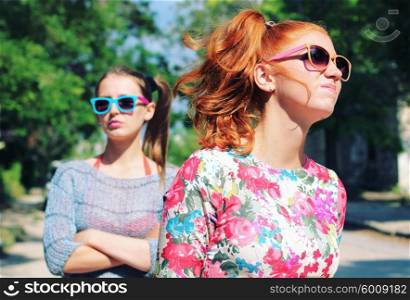 Two female friends in sunglasses