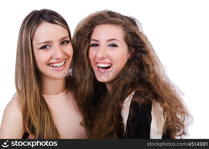 Two female friends isolated on the white