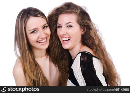 Two female friends isolated on the white