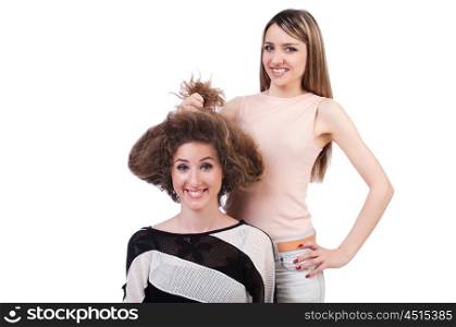 Two female friends isolated on the white