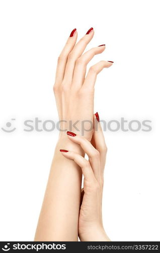 Two female hands with the manicure, isolated