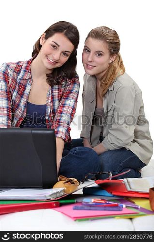 Two female students revising together