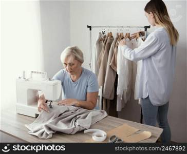 two female tailors studio working together