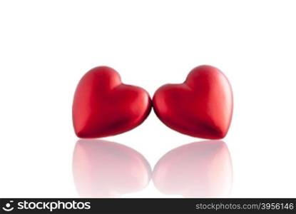 Two festive hearts for Valentine&amp;#39;s day. With mirror reflection